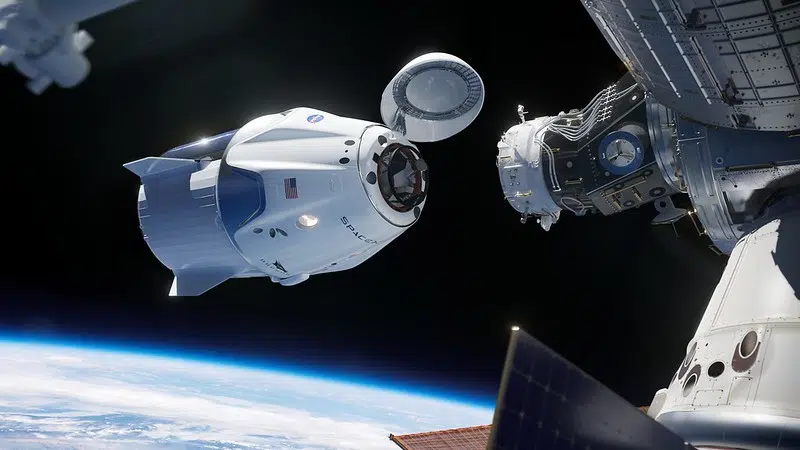 SpaceX Crew Dragon spacecraft approaches the International Space Station for docking.