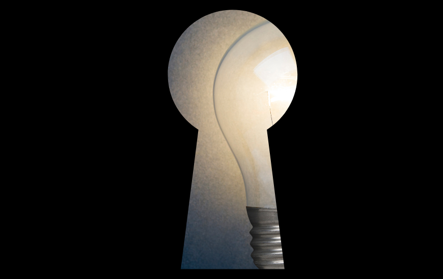 A light bulb, representing ideas, hidden and visible only through a keyhole.